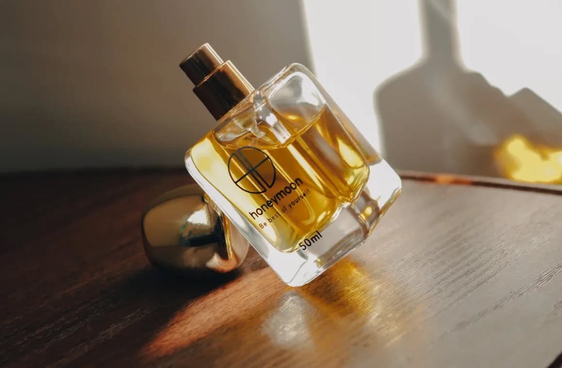 fregrance bottle on the wood table